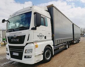 MAN TGX 26.460 XLX kapellbil + gardintrailer